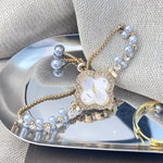 Diamond Set Color Light Luxury Drawstring Watch Exquisite Small Pearl Clover Drawstring Style Quartz Women's Watch